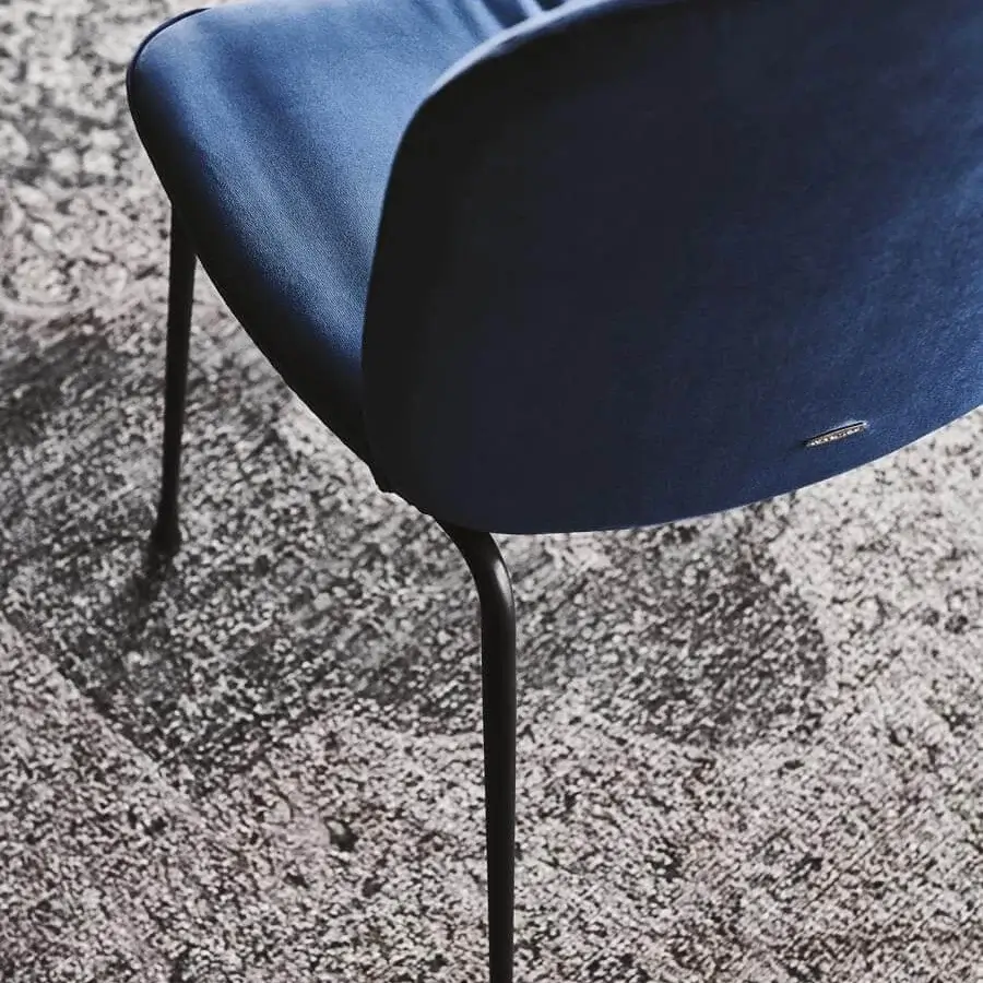 Elegant Cattelan Italia Tina chair in soft blue leather with graphite embossed lacquered steel frame