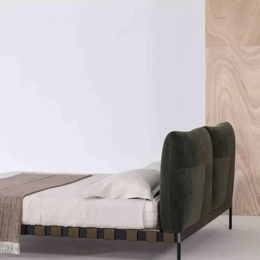 Captivating Cierre1972 Oscar bed with dark green woven upholstery and sleek metal legs crafted in Italy