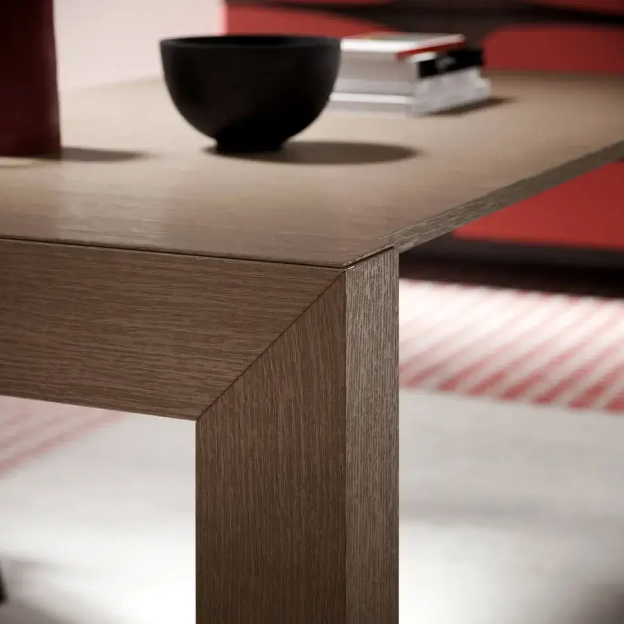 Elegant Ozzio Italia Minux console to table built with wood extensions and a medium brown wood grain finish
