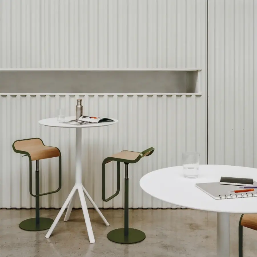 Distinguished Lapalma Lem stool with light-toned plywood seat and dark green powder coated metal frame