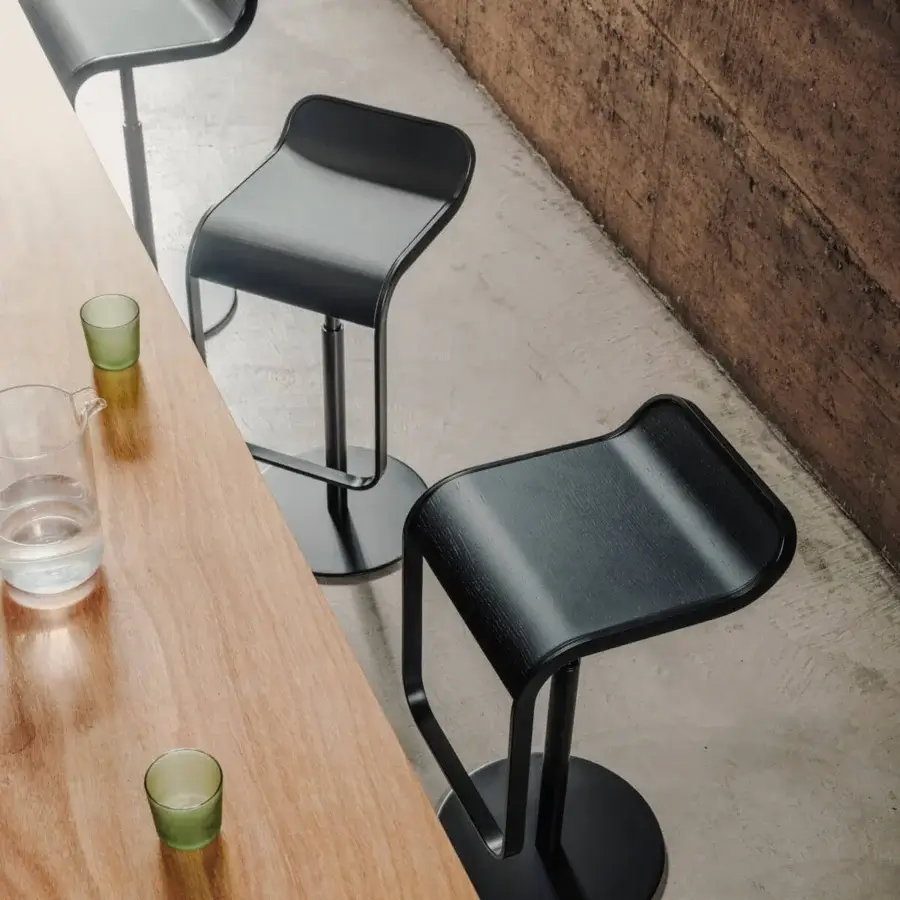 Elegant Lapalma Lem stool with dark stained plywood seat and matte chrome metal frame construction