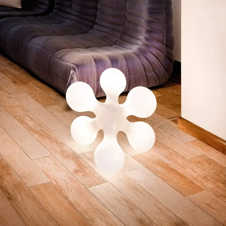 Architectural Kundalini Atomium floor lamp with rounded lobes and smooth matte white rotational-molded polyethylene diffuser crafted in Italy