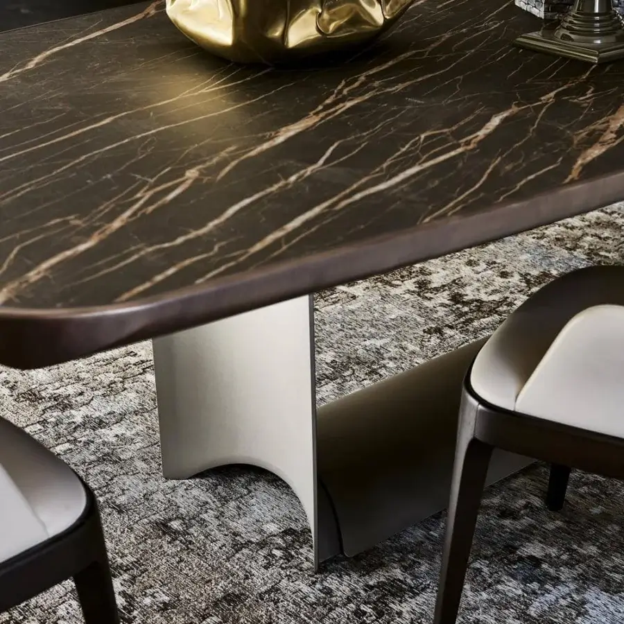 Distinguished Cattelan Italia Dragon table with a glossy ceramic Marmi Portoro top and embossed lacquered steel base