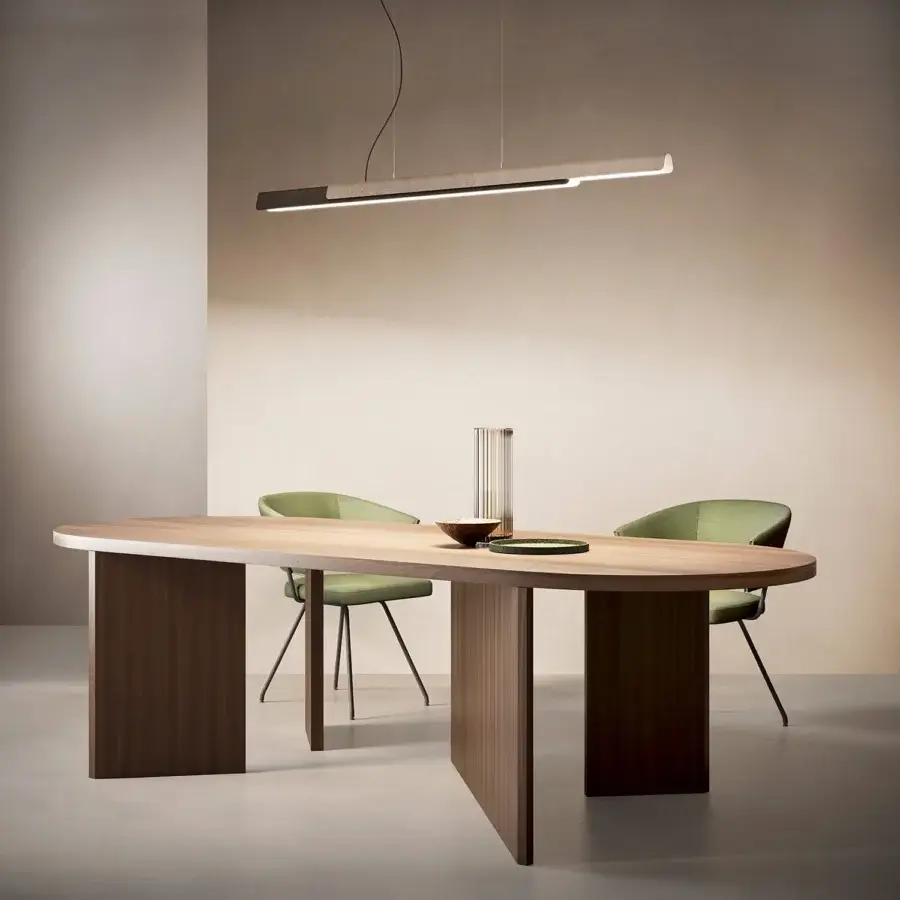 Exceptional Kundalini Dala Linear suspension lamp with a light textured body and dark metallic element, emitting bright illumination