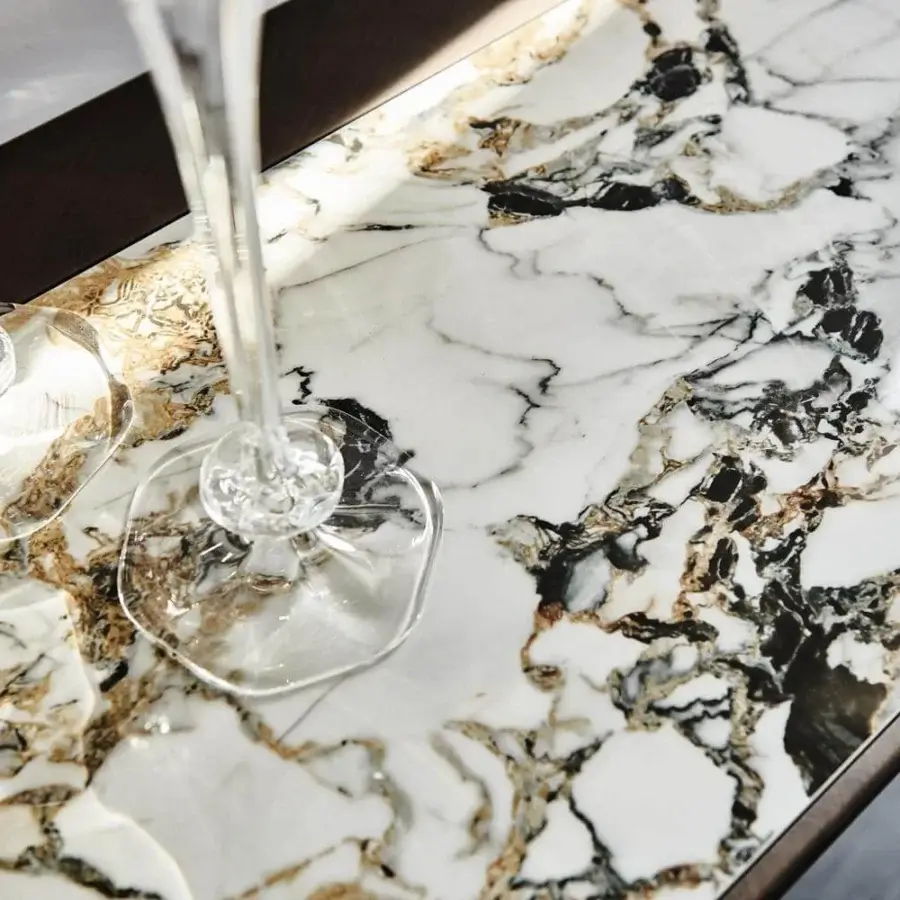 Superior Cattelan Italia Terminal Keramik console with marble-effect top displaying white, black and brown veining in brushed bronze or grey finish