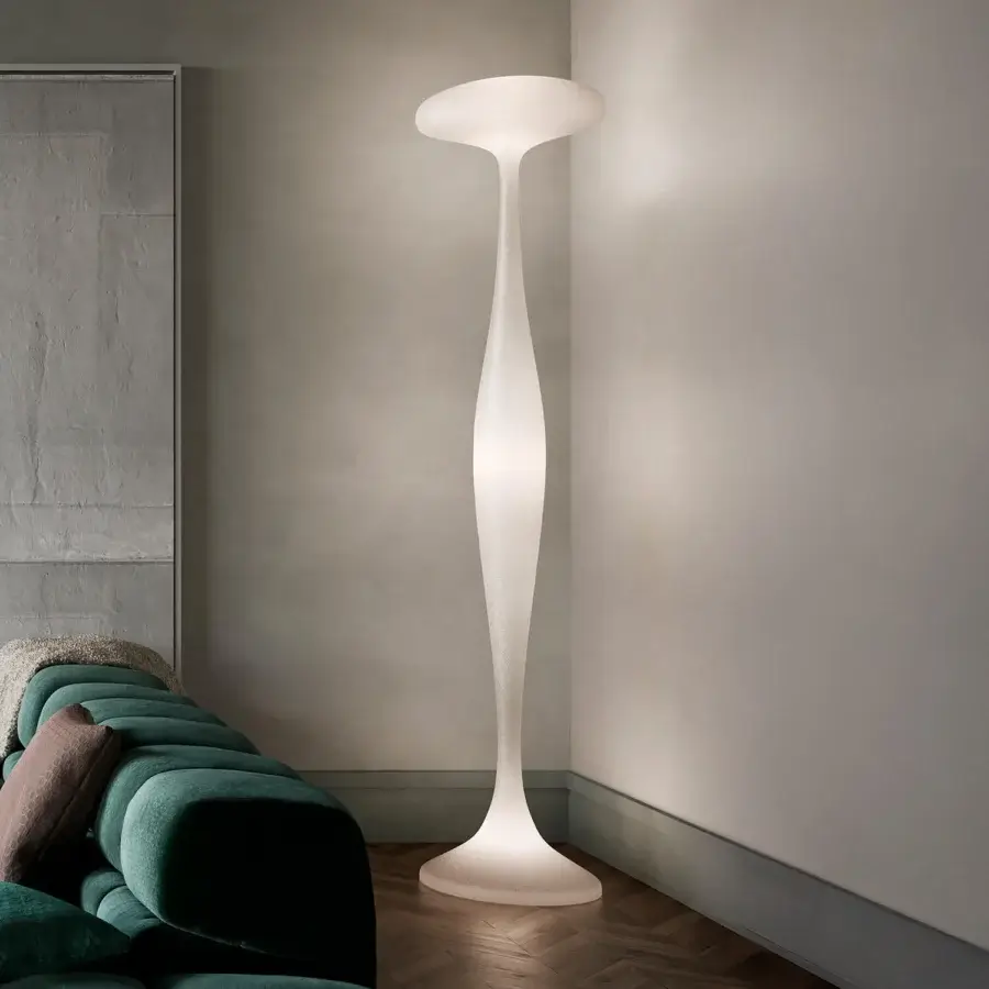 Elegant Kundalini E.T.A floor lamp with a sinuous ecological fiberglass light diffuser and metallic inner structure