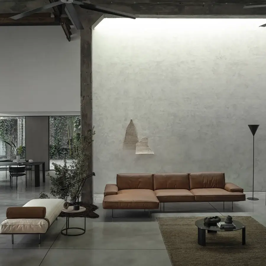 Architectural Cierre1972 Vogue sectional with warm brown matte leather upholstery and barely visible metal base