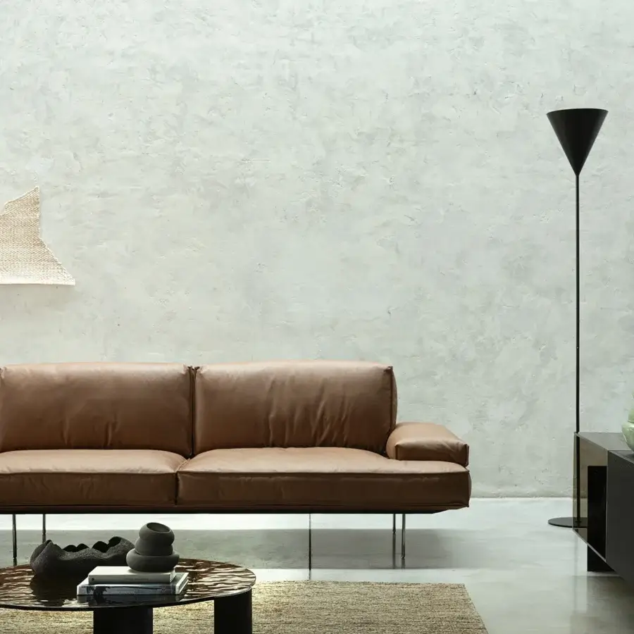 Distinguished Cierre1972 Vogue sectional with rich brown upholstery and thin metal legs exhibiting 1960s rationalist geometry