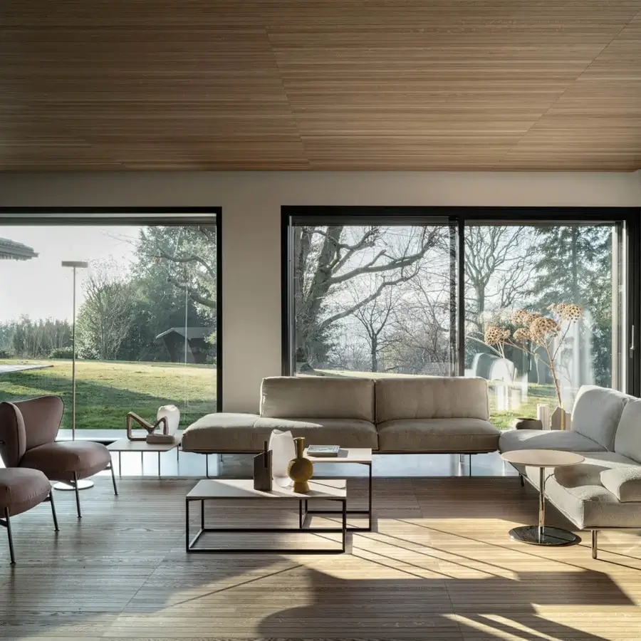 Harmonious Cierre1972 Vogue sectional in light gray textile with subtle beige accents and distinctive metal legs