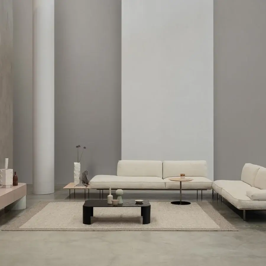 Exceptional Cierre1972 Vogue sectional in light beige textile with dark metal support and visible stitching