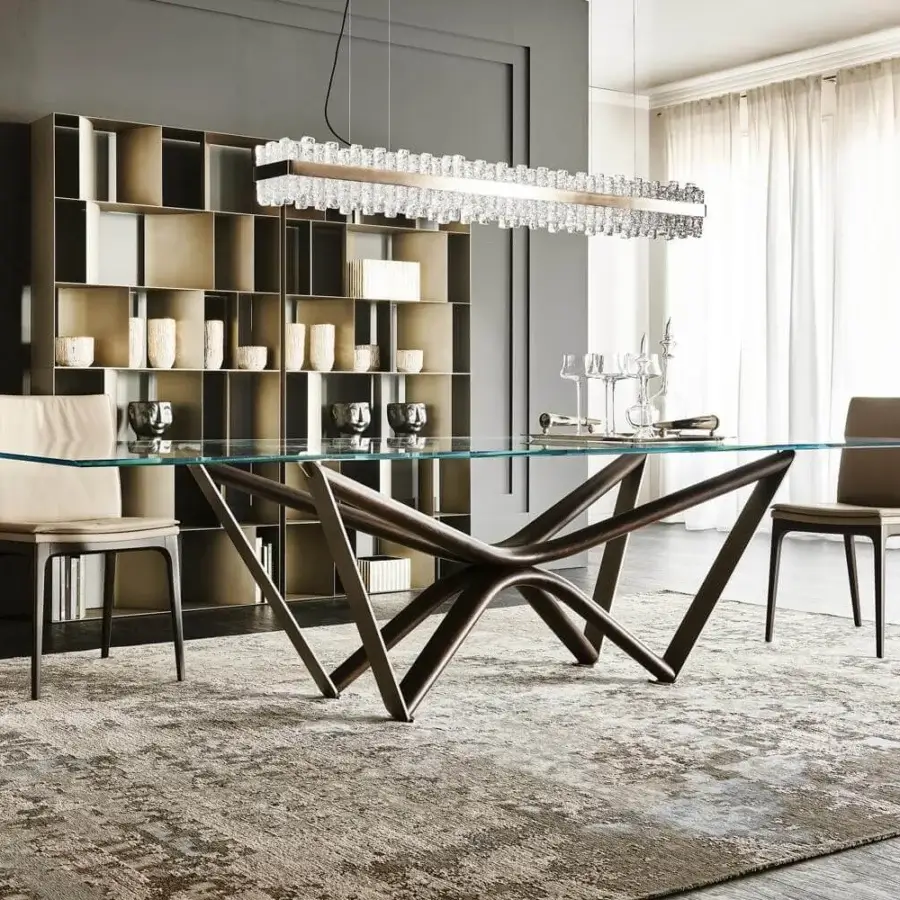 Distinguished Cattelan Italia Marathon table with clear glass top and solid Canaletto walnut sculptural base