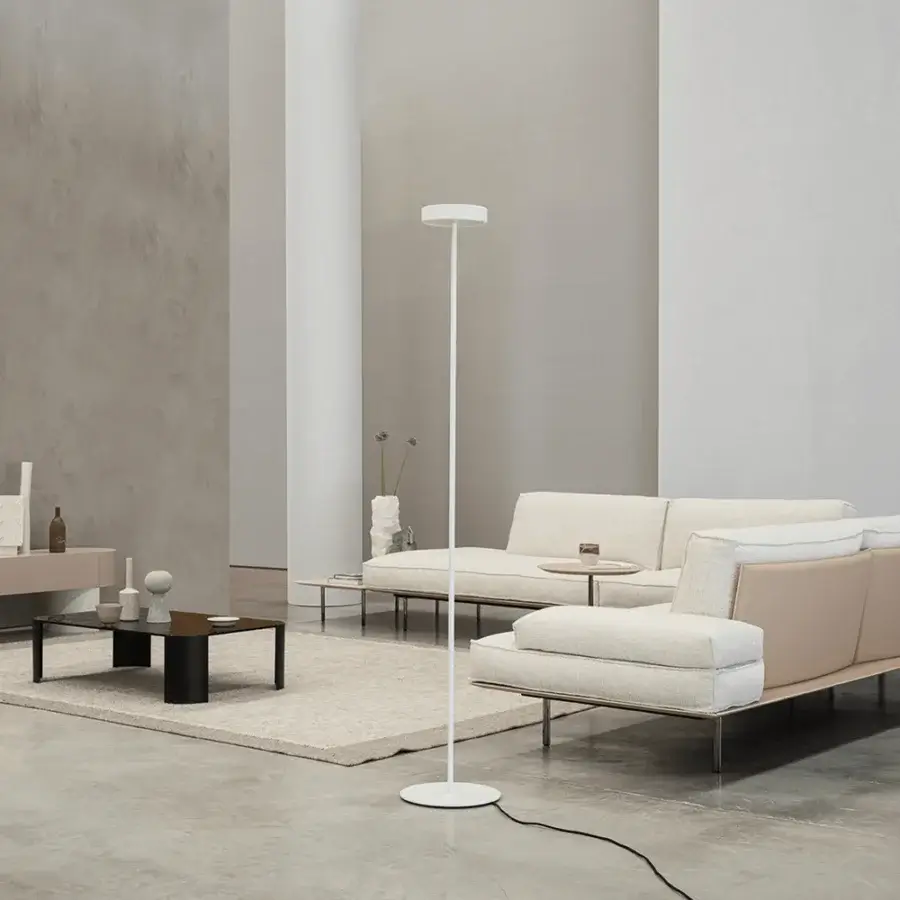 Architectural Cierre1972 Vogue sectional in light textile with contrasting beige and sleek elevated metal base