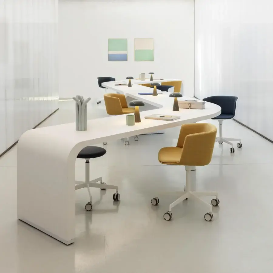 Exceptional Lapalma Brunch workstation presents a serpentine form with white laminate and powder-coated metal legs
