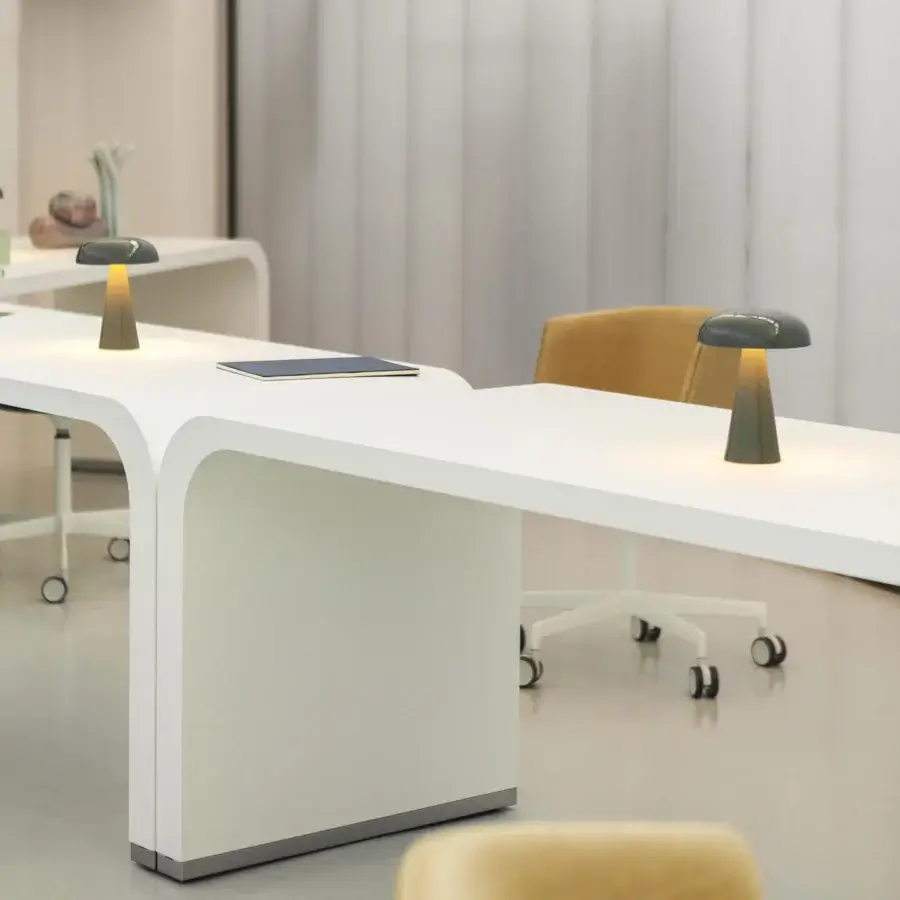 Distinguished Lapalma Brunch workstation presents a white Fenix tabletop with a white powder-coated metal base and mushroom lamps