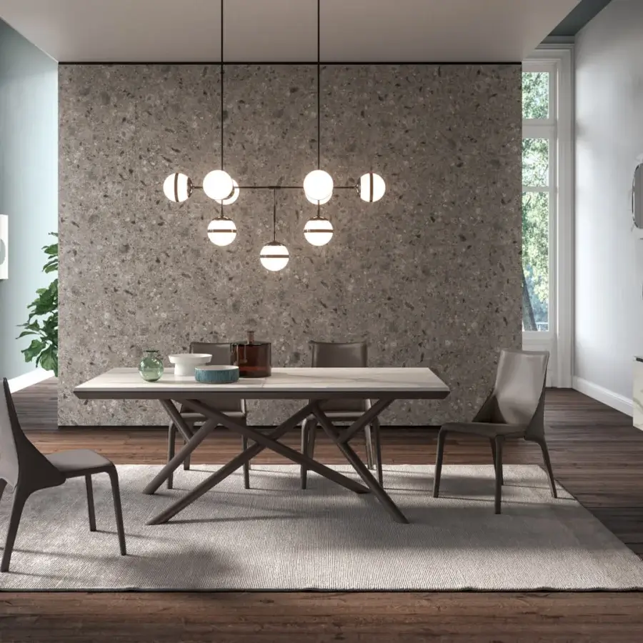 Distinguished Ozzio Italia Random extendable table with light gray marble glass top and matte dark metal geometric base
