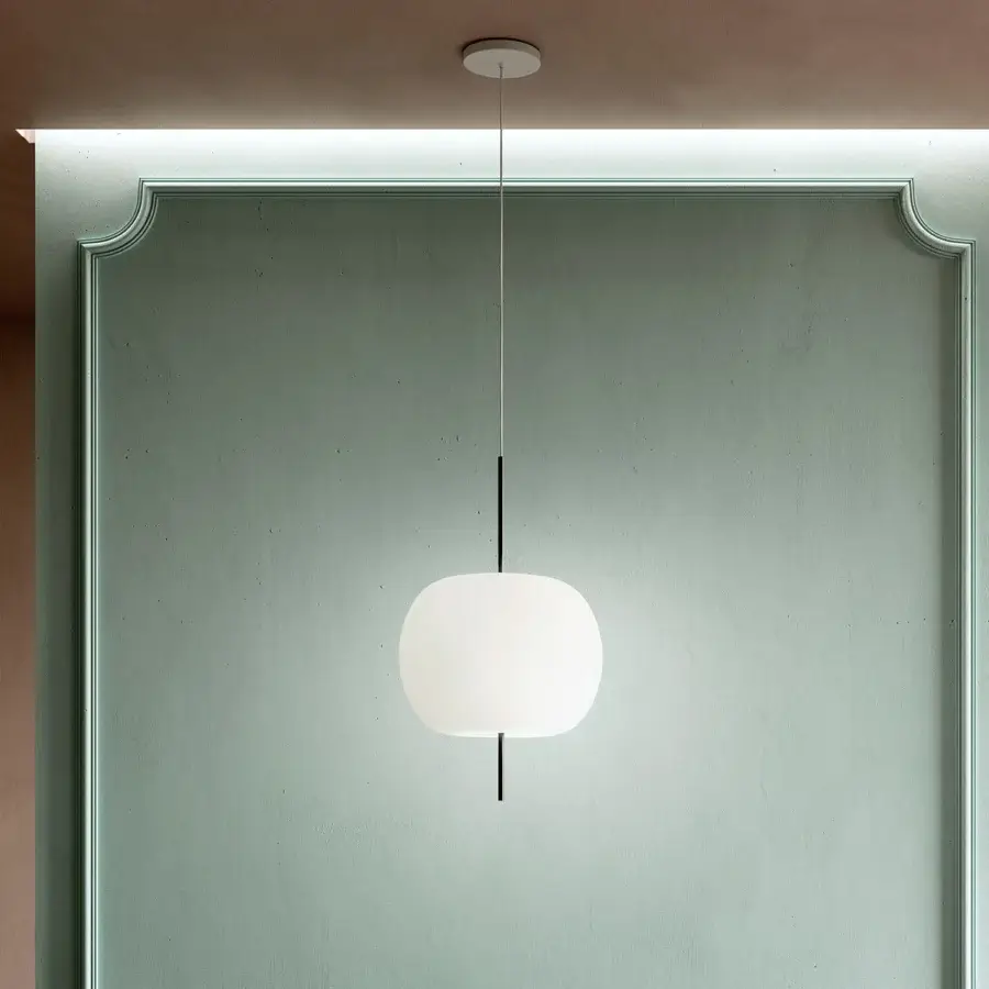 Elegant Kundalini Kushi suspension lamp with a mouth-blown opal glass diffuser and sleek black rods