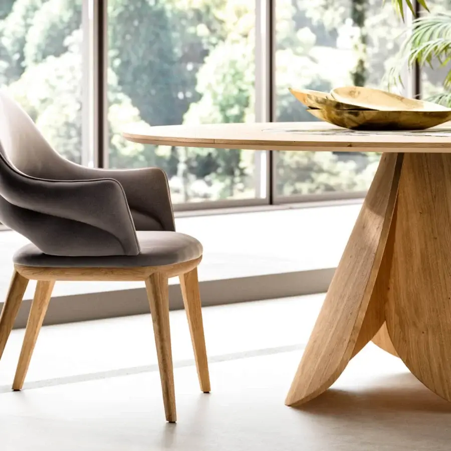Elegant Ozzio Italia Veliero table in light wood with a sculptural base crafted from interlocking wooden elements and ceramic tray