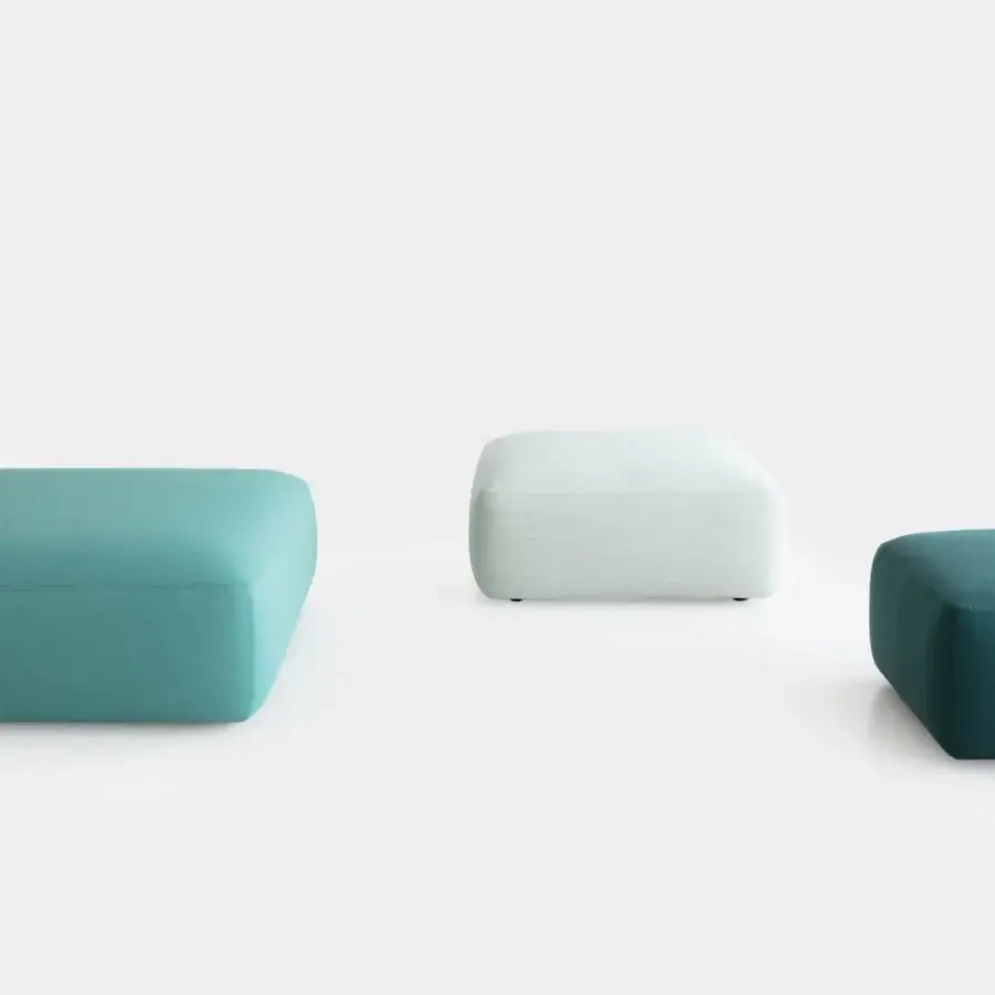 Exceptional Lapalma Plus ottoman upholstered in smooth off-white textile with dark polypropylene glides