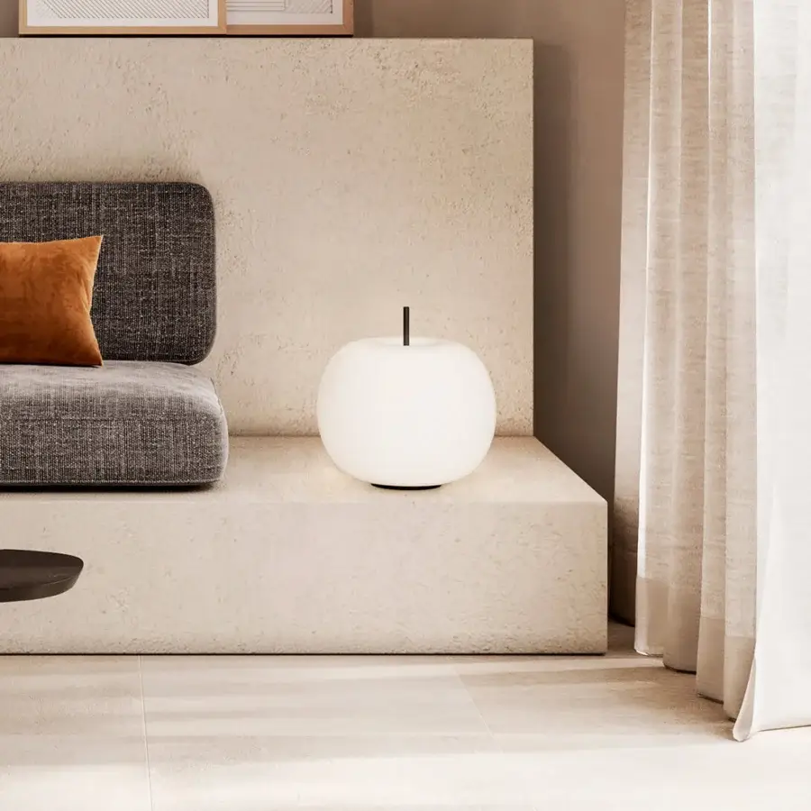Distinguished Kundalini Kushi table lamp with spherical opal diffuser and sleek black coated metallic body crafted in Italy
