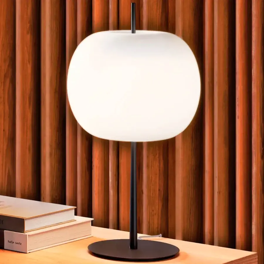Captivating Kundalini Kushi XL lamp with dual-layer opal glass diffuser and sleek matte black metallic body