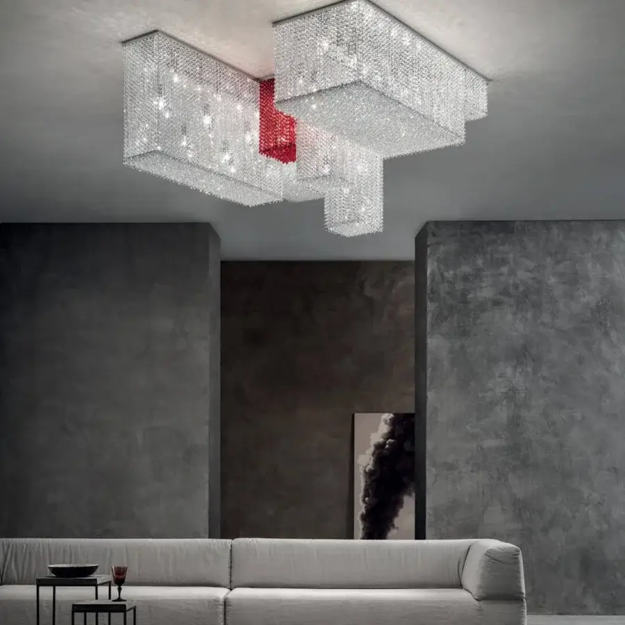 Innovative Masiero Cubo ceiling lamp with a shiny chrome metal frame and exclusive transparent red crystal pendants