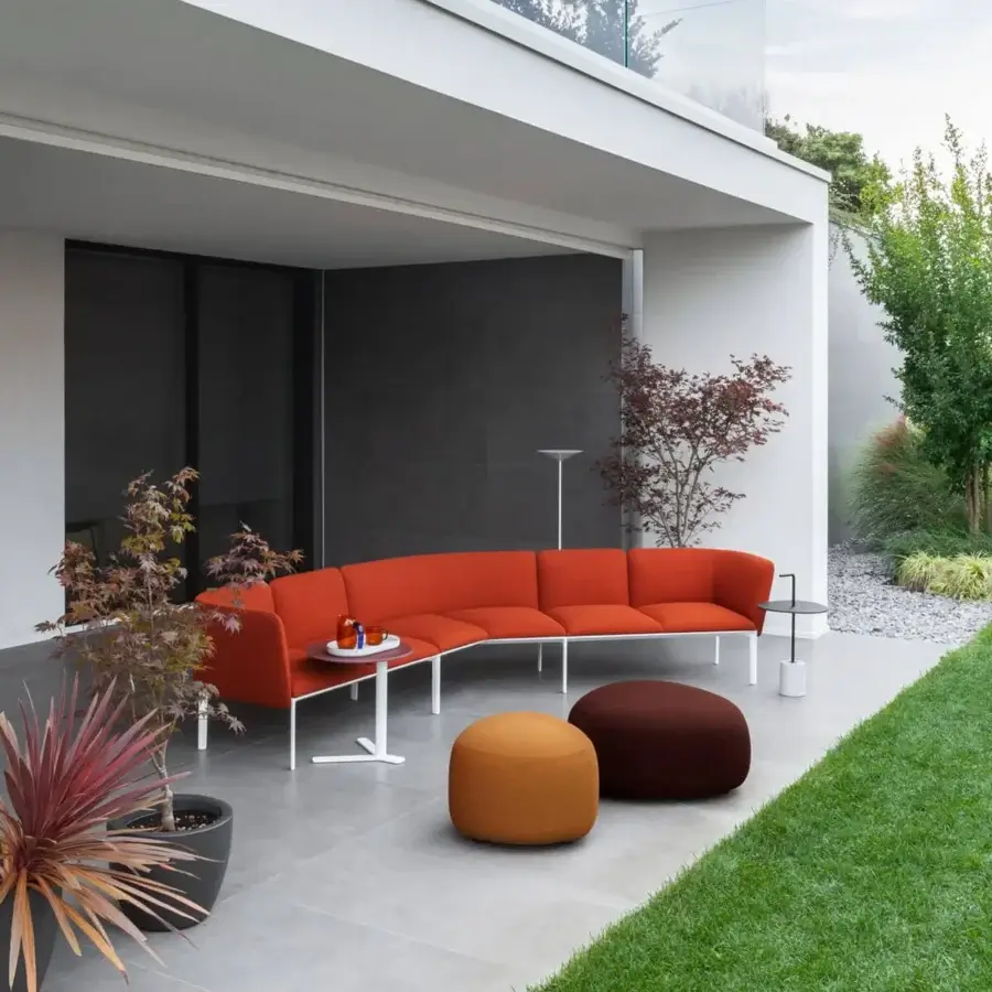 Superior Lapalma Kipu outdoor ottoman with rounded triangular shape crafted in warm orange-brown and dark brown UV stable fabric