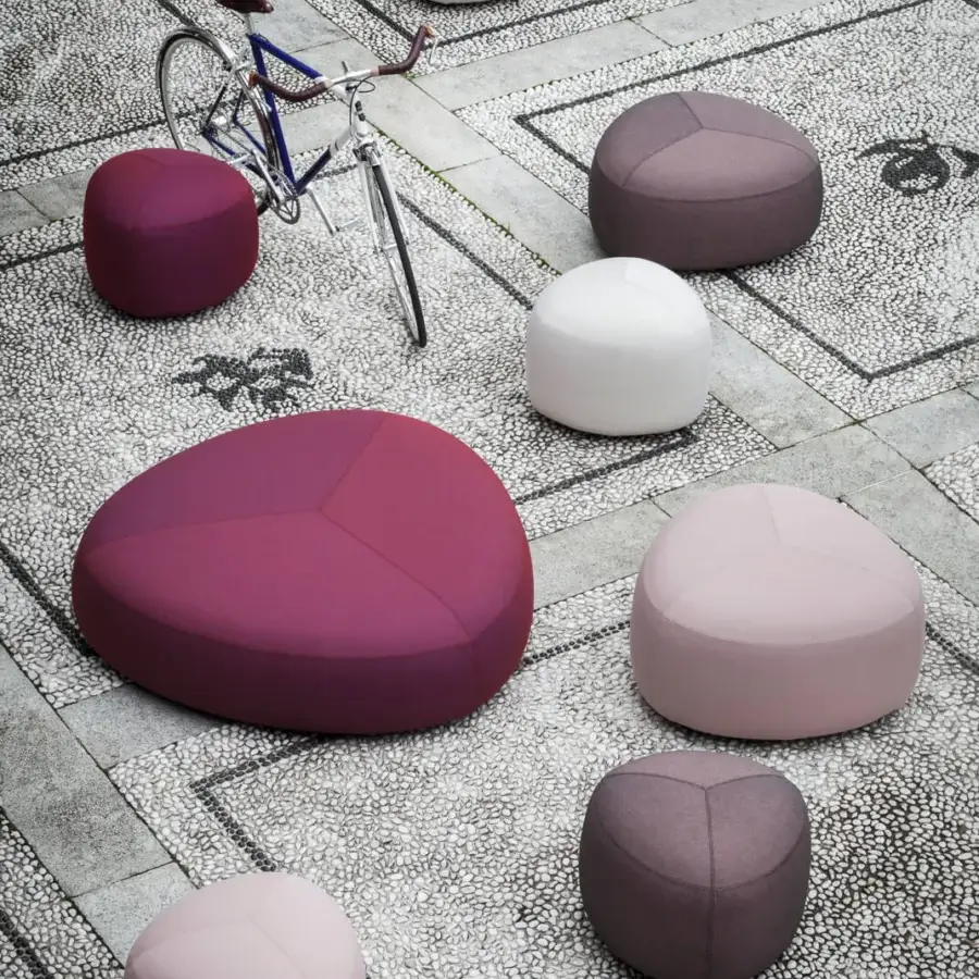 Exclusive Lapalma Kipu outdoor ottoman with rounded triangular form upholstered in matte dark pink marine plywood base