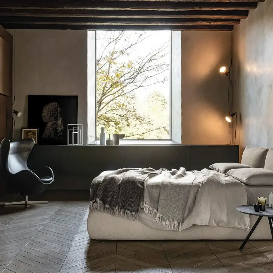 Distinguished Bolzan Letti Venus bed with firwood structure and light beige textile upholstery exhibiting a matte finish