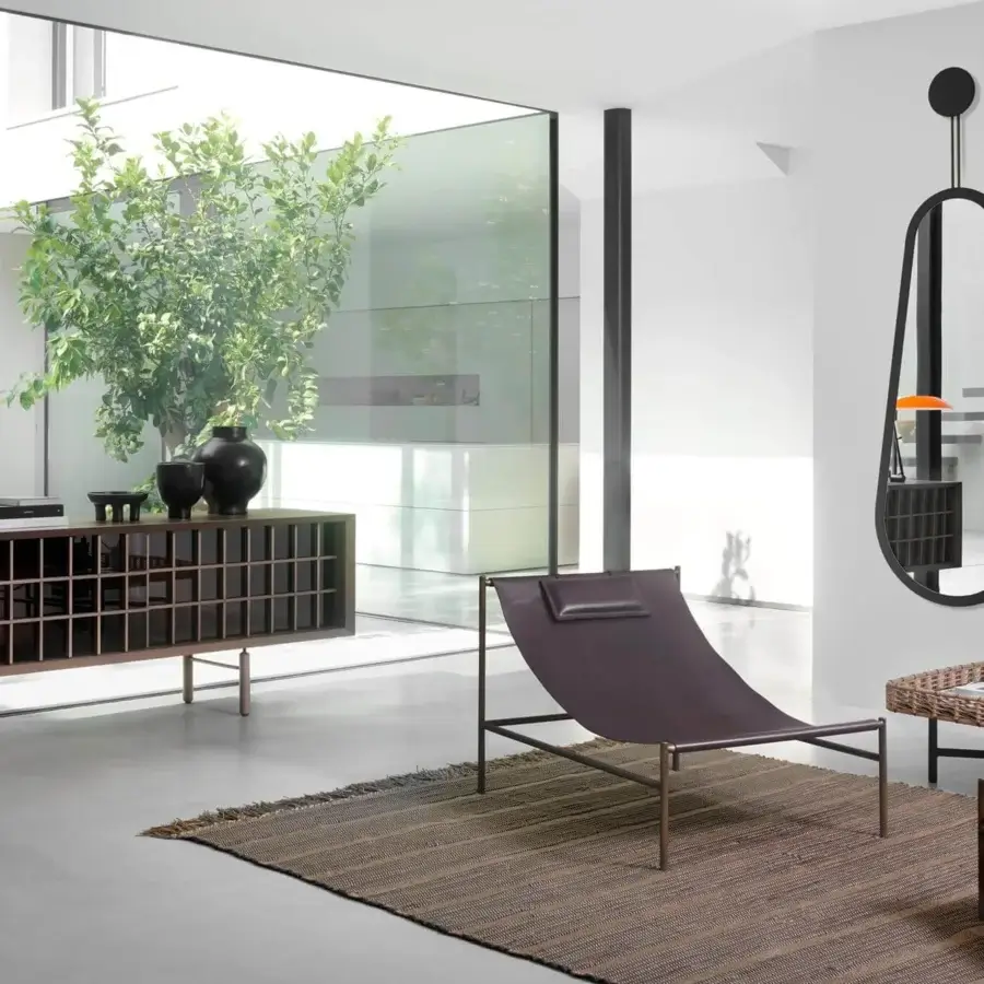 Elegant Potocco Sen sideboard crafted with ash in a dark matte stain and bronzed glass sliding doors concealing shelves