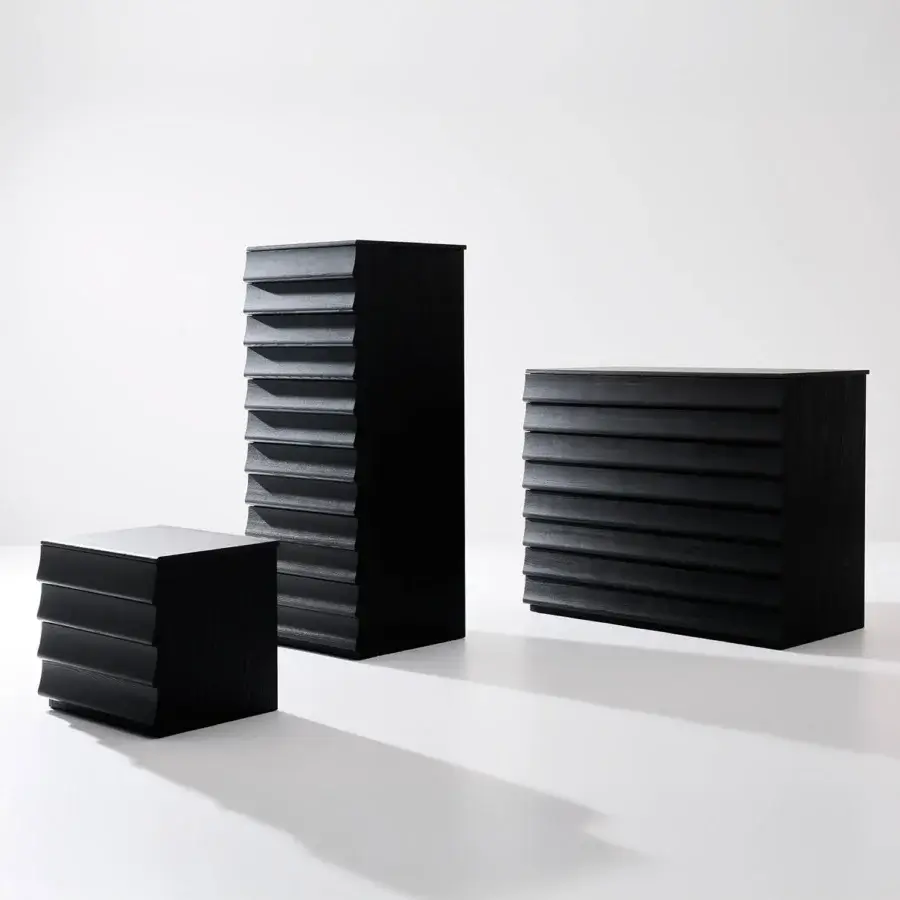 Distinguished Bolzan Letti Rideaux nightstand crafted with ash wood and visible grain, presenting a uniform dark tone achieved with beeswax fixed pigments