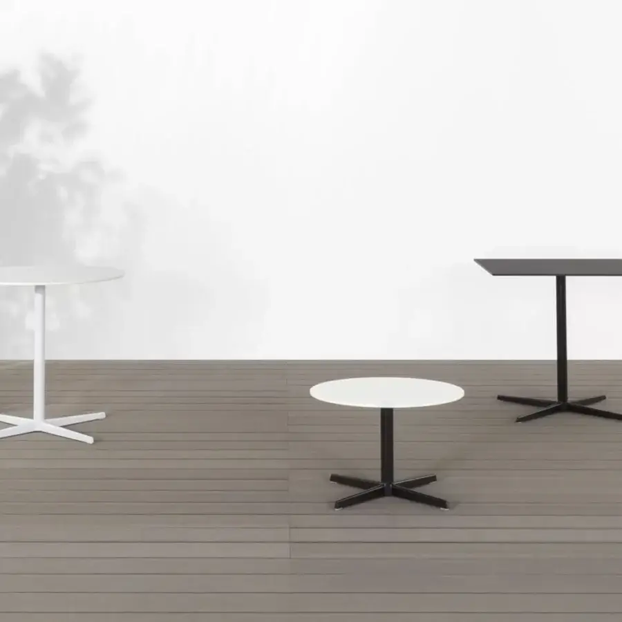 Elegant Lapalma Outdoor Auki coffee table with a round white HPL Fenix® top and white powder-coated polyester base