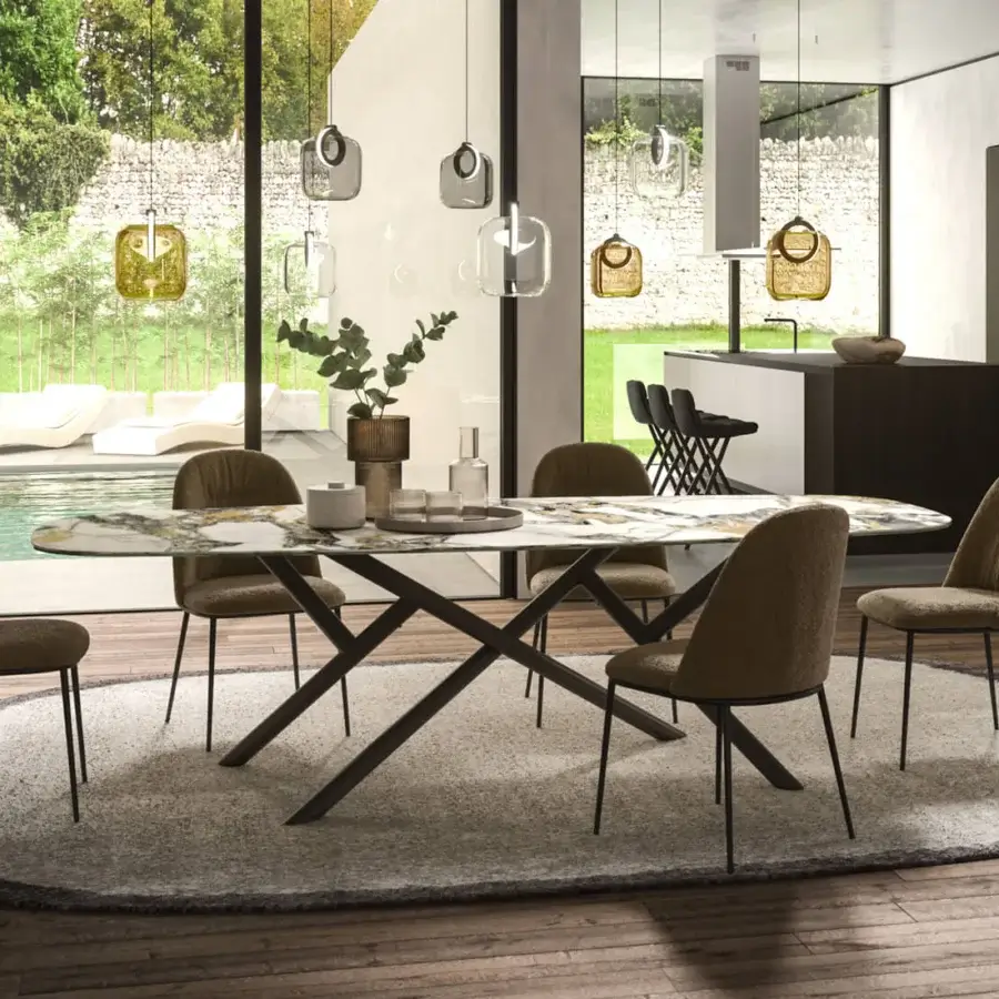 Sophisticated Ozzio Italia Random table with marbled oval top and dark matte X-shaped metal tube base