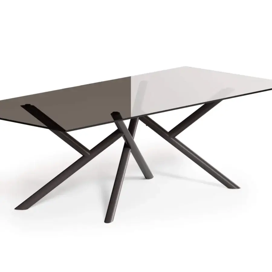 Distinguished Ozzio Italia Random table with a half-tinted glass surface and dark matte metal base built with visible welds