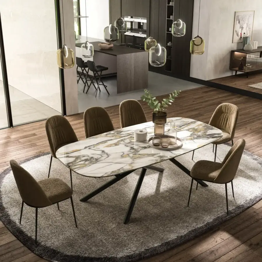 Distinguished Ozzio Italia Random table crafted with a smooth marble top exhibiting white, gray, and gold streaks paired with a dark metal base