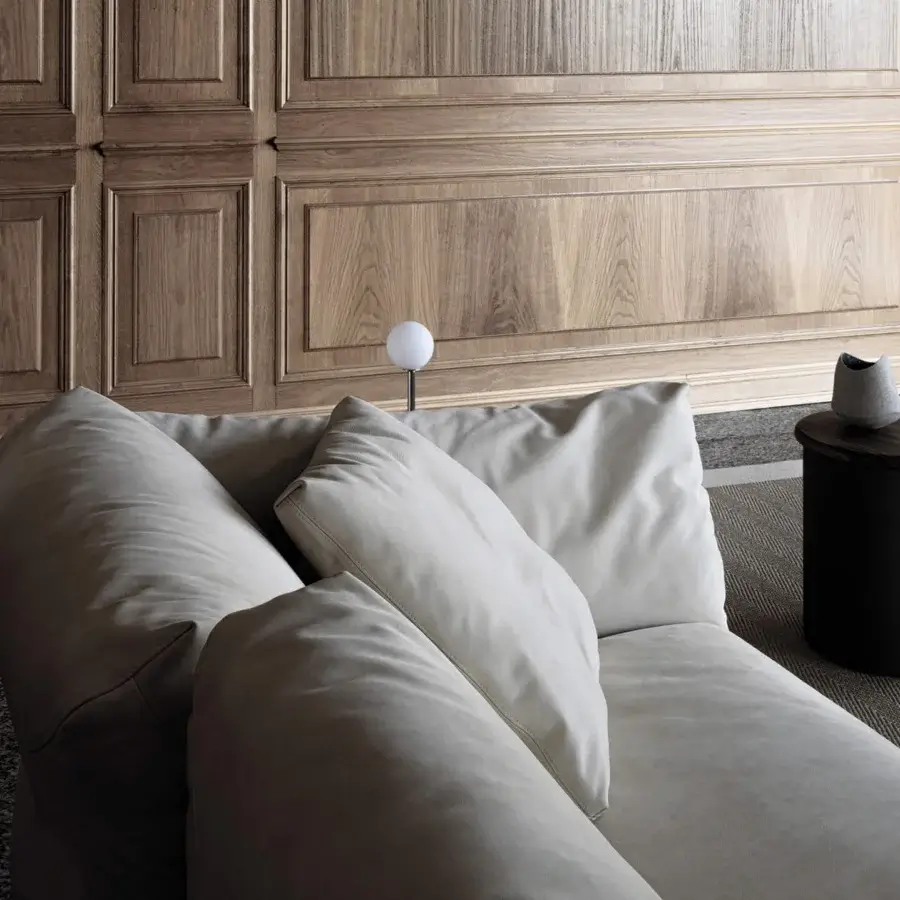 Distinguished Cierre1972 Chapeau sofa upholstered in soft off-white textile with reclining backrests and included decorative cushions
