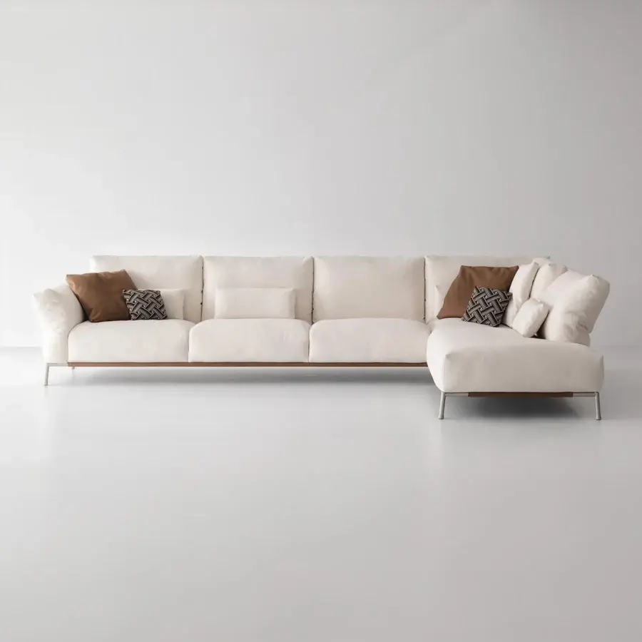 Distinguished Cierre1972 Chapeau sectional upholstered in light beige textile with reclining backrests and armrests accented with patterned cushions