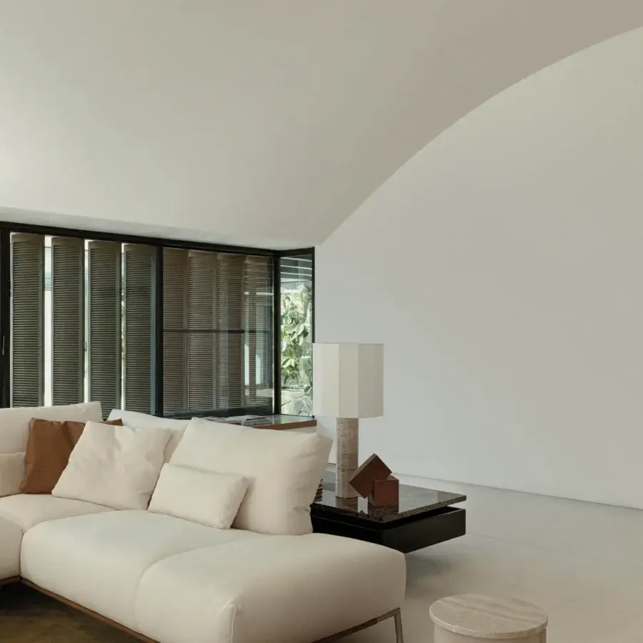 Harmonious Cierre1972 Chapeau sectional upholstered in matte off-white textile with brown leather cushions and reclining backrests