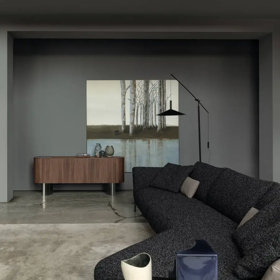 Lavish Cierre1972 Chapeau sectional upholstered in textured dark gray textile with reclining backrests and armrests