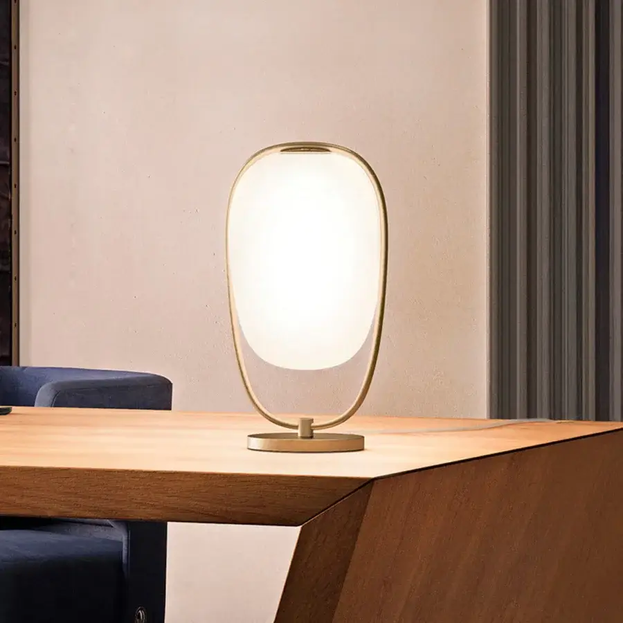 Captivating Kundalini Lannà table lamp with an opal diffuser built in two layers of blown glass and a metallic coated structure