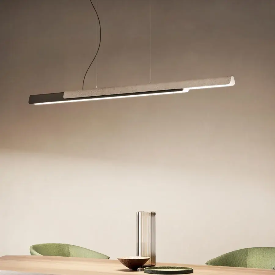 Elegant Kundalini Dala Linear suspension lamp with neutral beige metallic coated structure and slender black cable