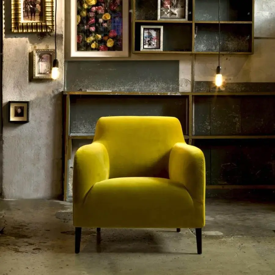 Exceptional Verzelloni Divanitas lounge chair upholstered in vibrant yellow textile with burnished cast aluminum legs