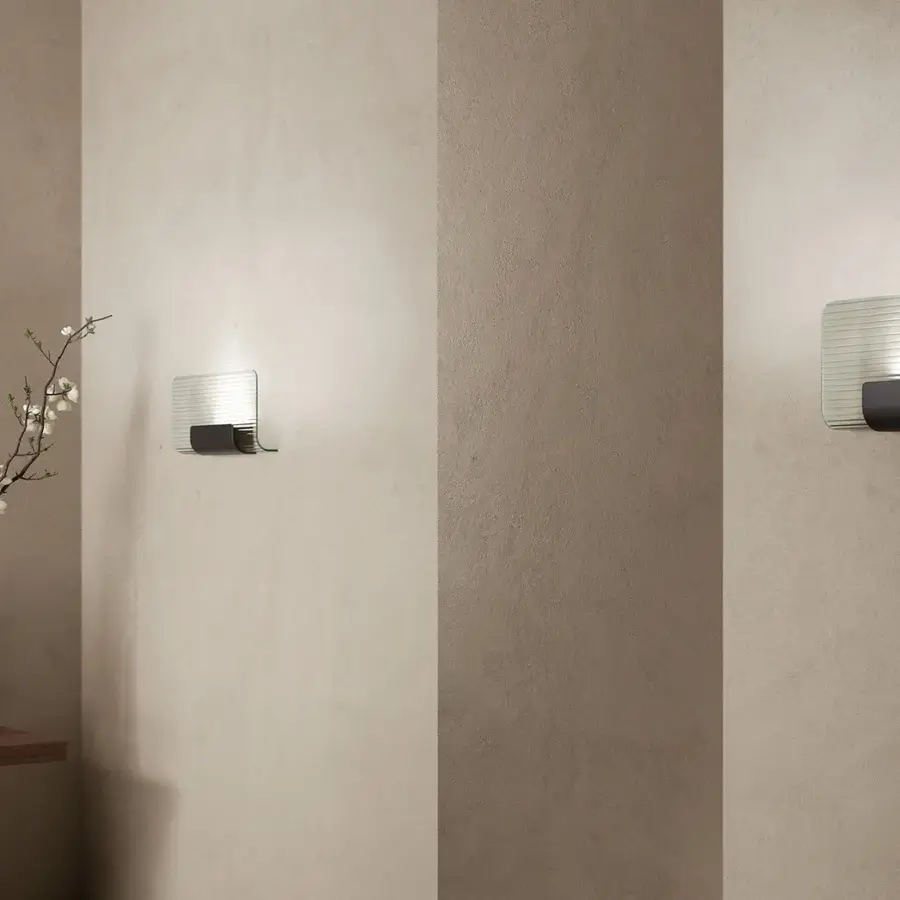 Exceptional Kundalini Nami wall lamp with curved glass diffuser and varnished die-casted aluminum in a dark tone