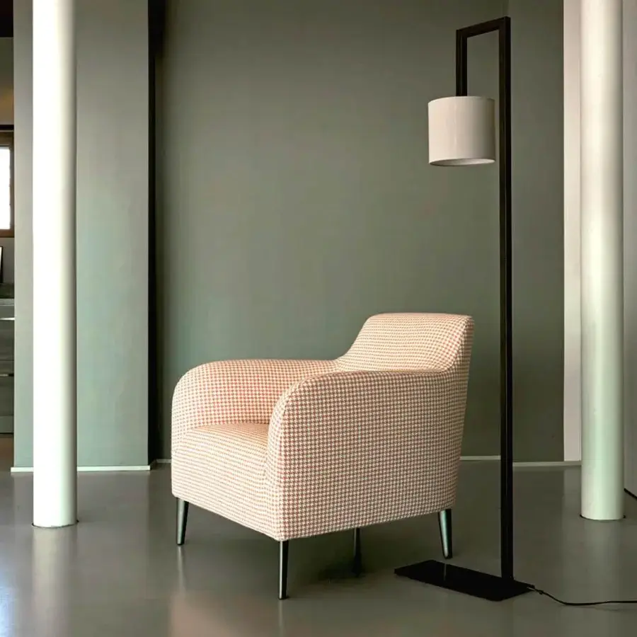 Superior Verzelloni Divanitas lounge chair upholstered in off-white and peach houndstooth textile with burnished cast aluminium legs