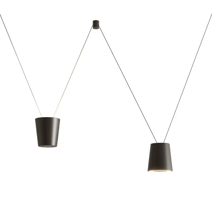 Elegant Kundalini Sling suspension lamp with die-casted aluminum and a dark finish illuminating spaces with warm geometries