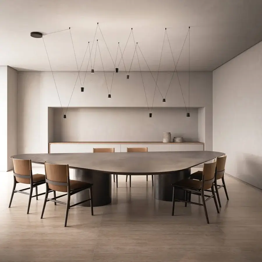 Distinguished Kundalini Sling suspension lamp with die-casted aluminum and matte black finish creating a dynamic geometric installation