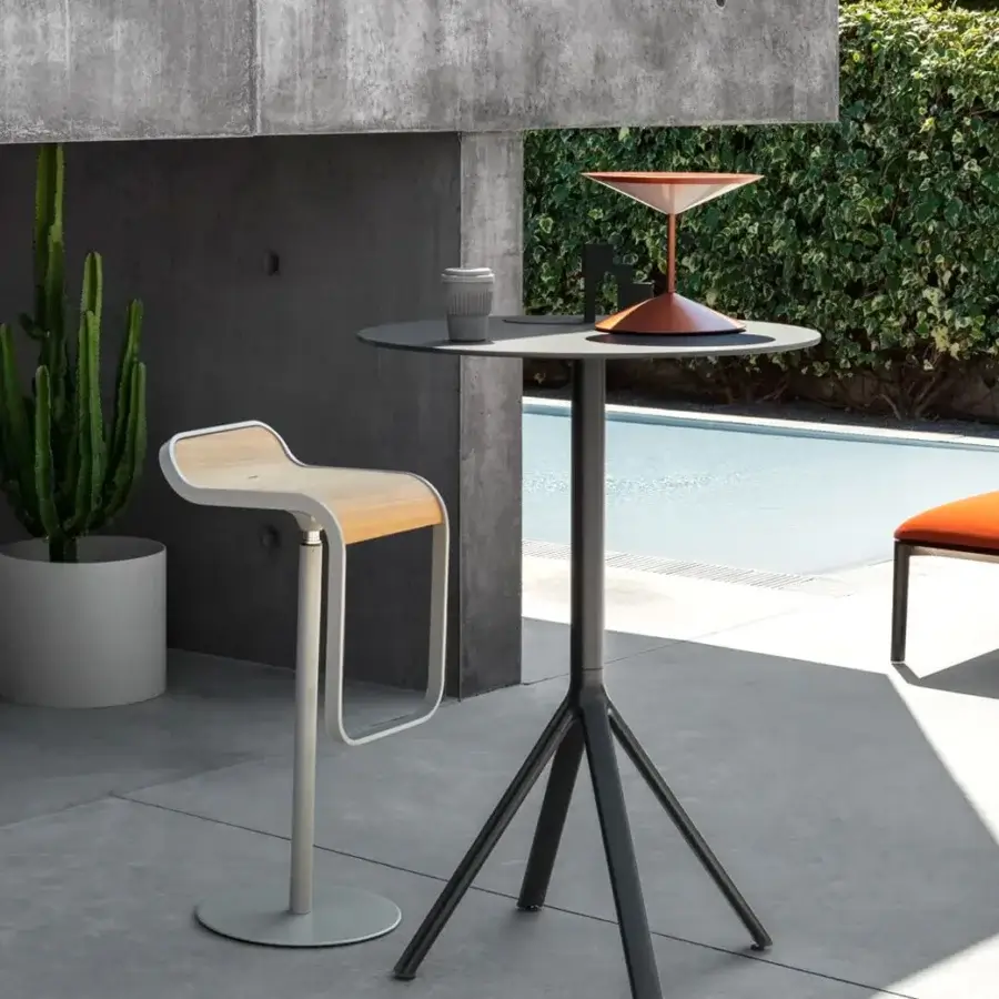 Sophisticated Lapalma Fork bar table with round dark gray HPL laminate and slender aluminum tripod base crafted with polyester powder coating