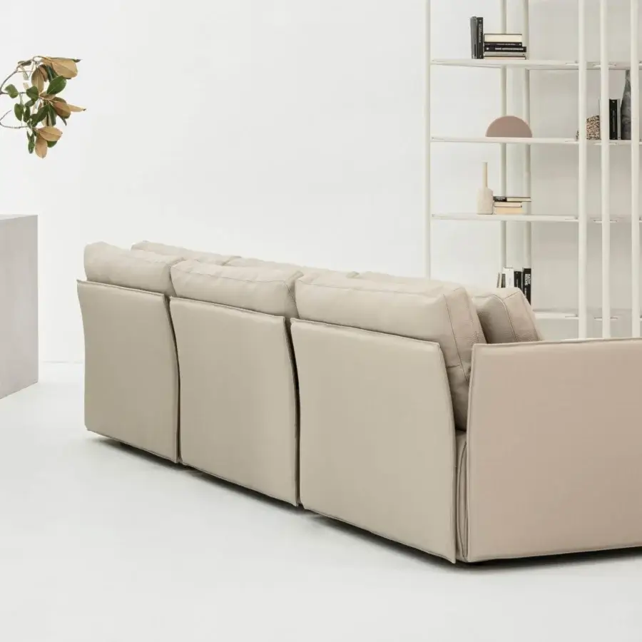Refined Cierre1972 Tab sofa crafted in Italy with a wide seat and tailored sewing edge in light beige textile