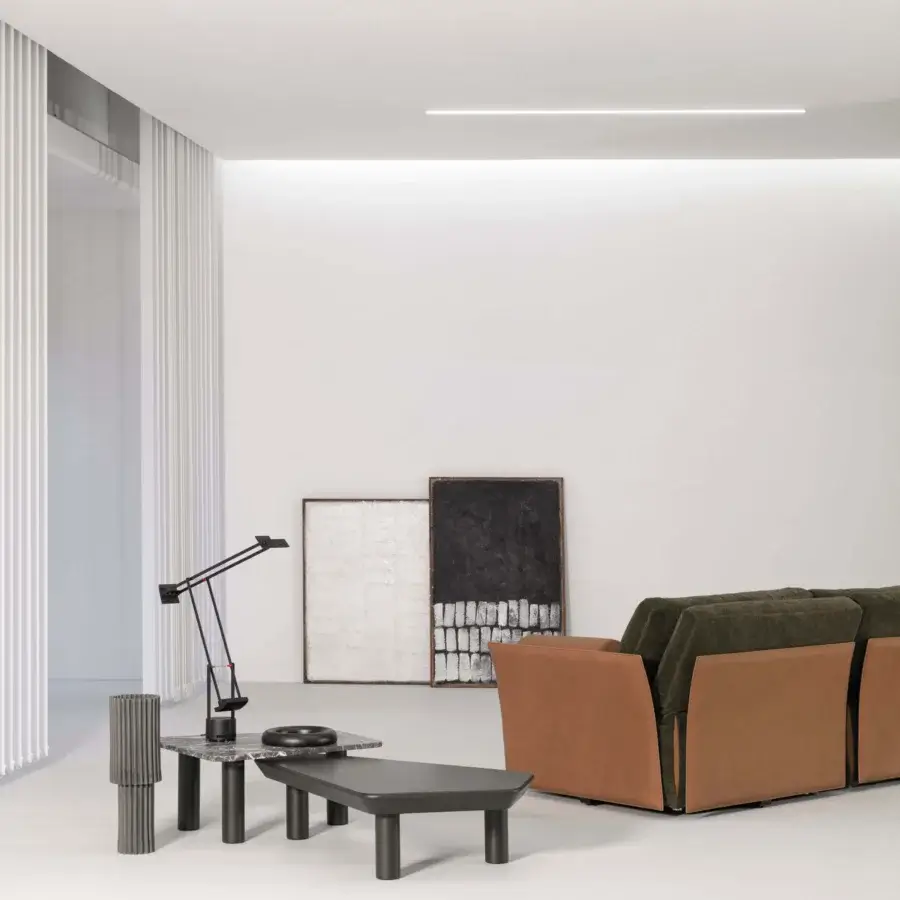Exceptional Cierre1972 Tab Sofa sofa crafted with light brown leather-like material and dark green textile backrests with tailored sewing edges