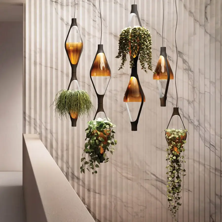Elegant Kundalini Viceversa suspension lamp with amber mouth-blown glass and matte metal frame crafted in Italy