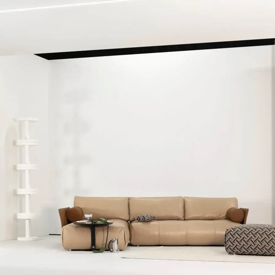 Distinguished Cierre1972 Tab sectional upholstered in smooth tan textile with darker brown tailored edge accents crafted in Italy